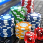 Virtual casino. Online gambling. Laptop with dice and chips. 3d